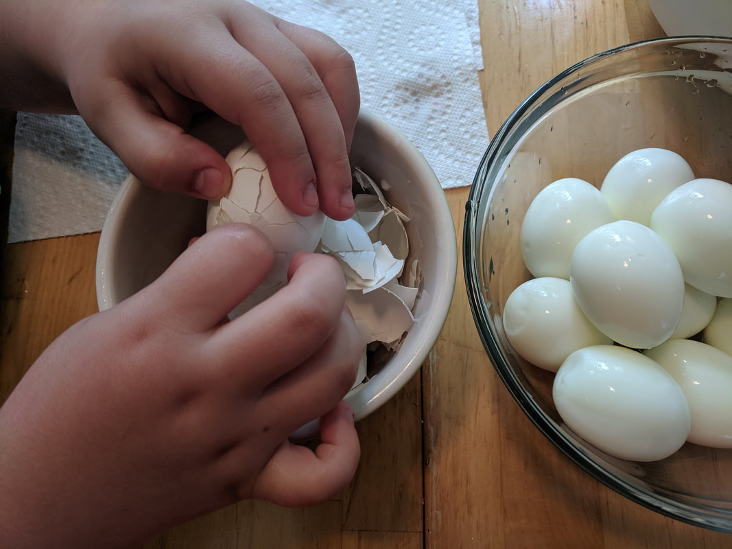 Cracking eggs to take off shells